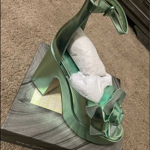 Teal Jeffrey Campbell flower heel.